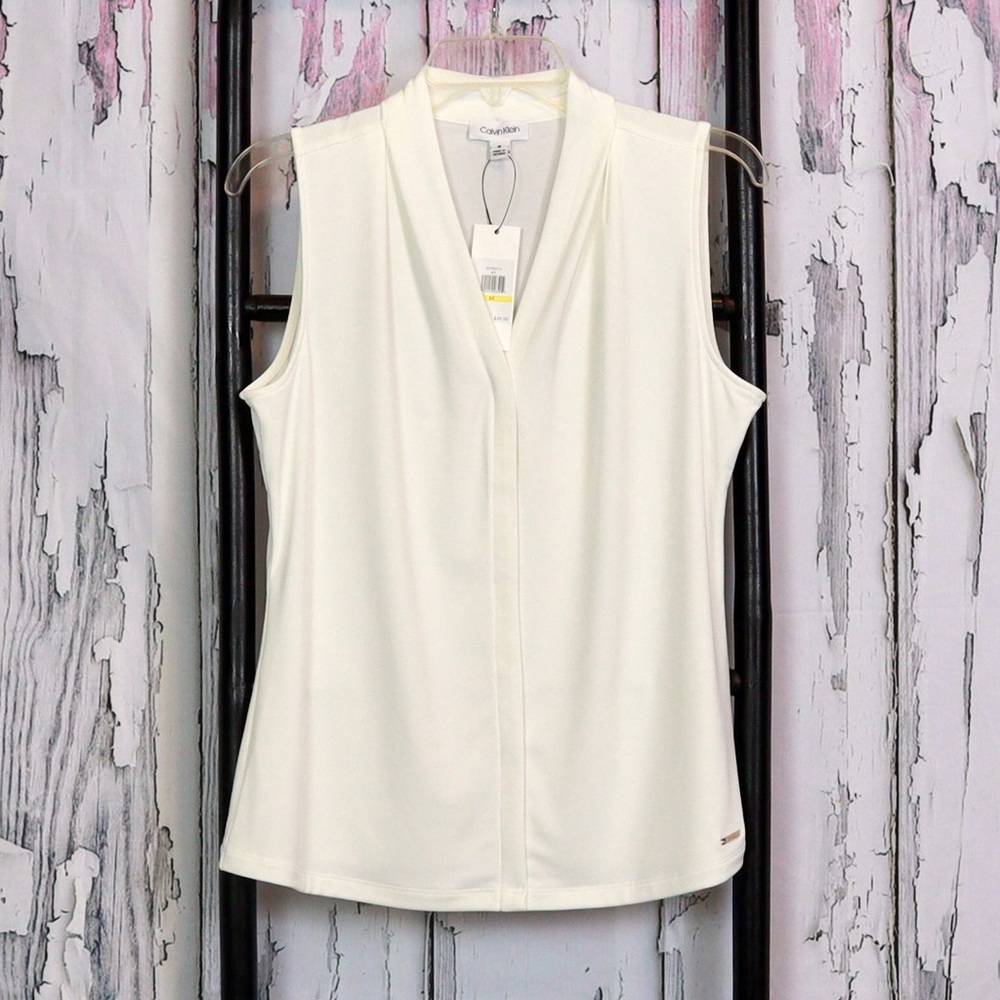 Calvin Klein sleeveless blouse.